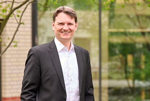 Dr. Philip_Tauschek_syracom_AG